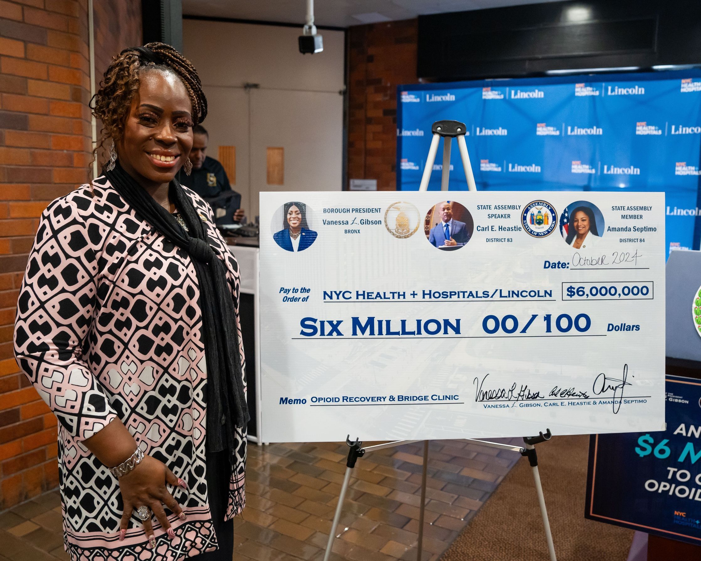 Bronx Boro President Vanessa Gibson With $6Mil Check for Opioid recovery center in Bronx NY.jpg