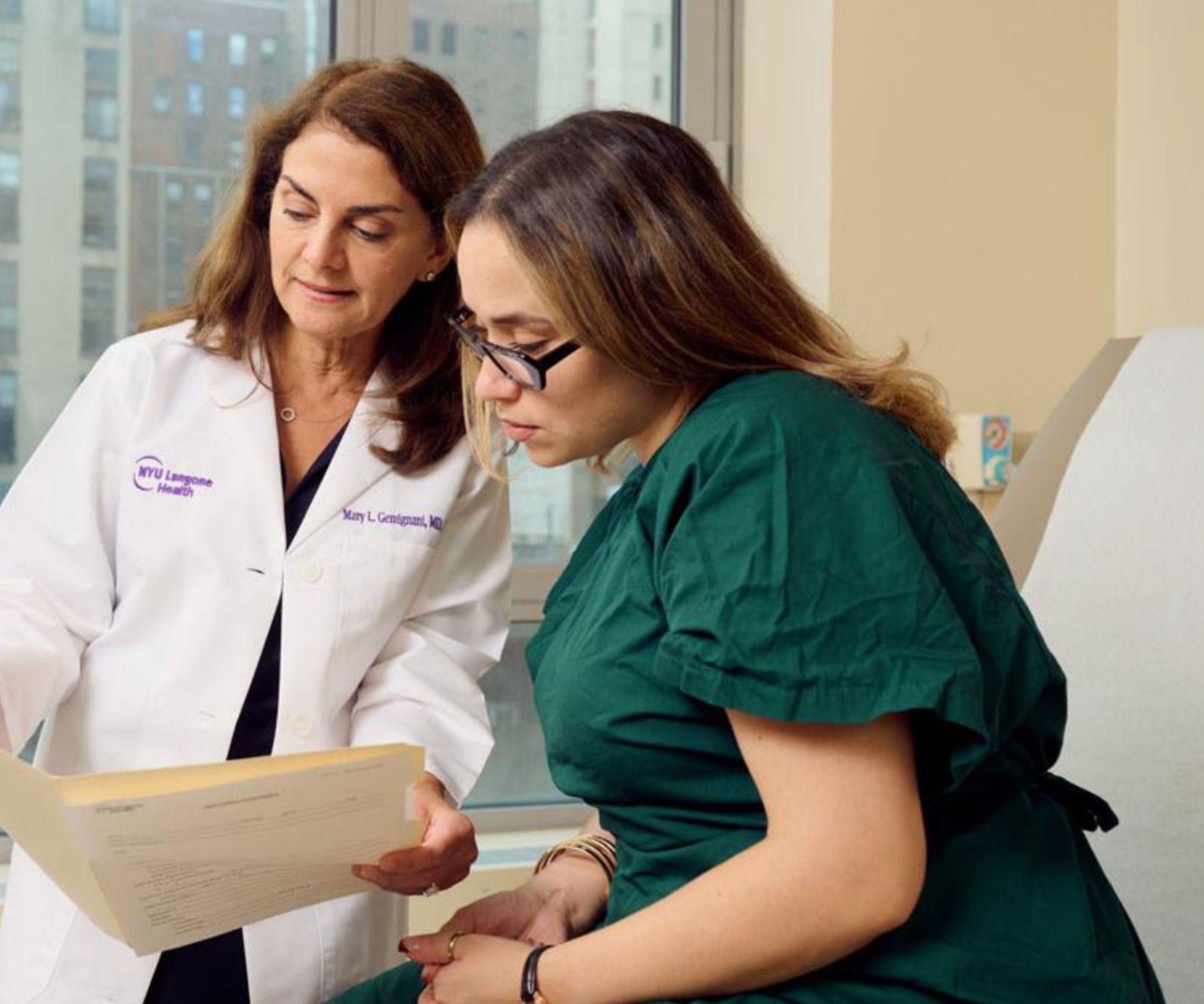 NYU Langone oncologists Dr. Mary L. Gemignani (shown counseling a patient above) and Dr. Elizabeth Comen discuss the rise of breast cancer diagnoses in younger adults. 